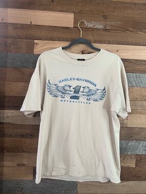 Harley-Davidson Men’s Cream Tee with Blue Wing Graphic